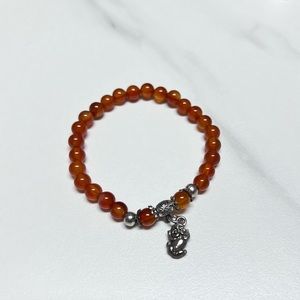 Red Beaded Bracelet with Silver Charm